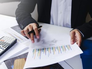  image of financial reports and graphs.