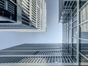  image of commercial building complex with sky in the middle